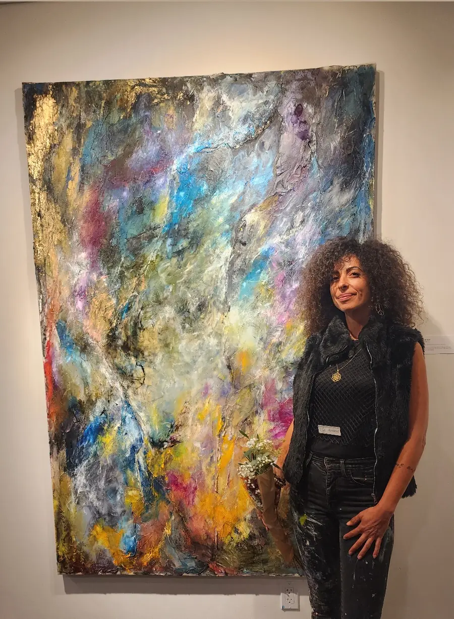 Galeet beside her large painting at the Formless and Void exhibition, Upside Down gallery, Westwood
